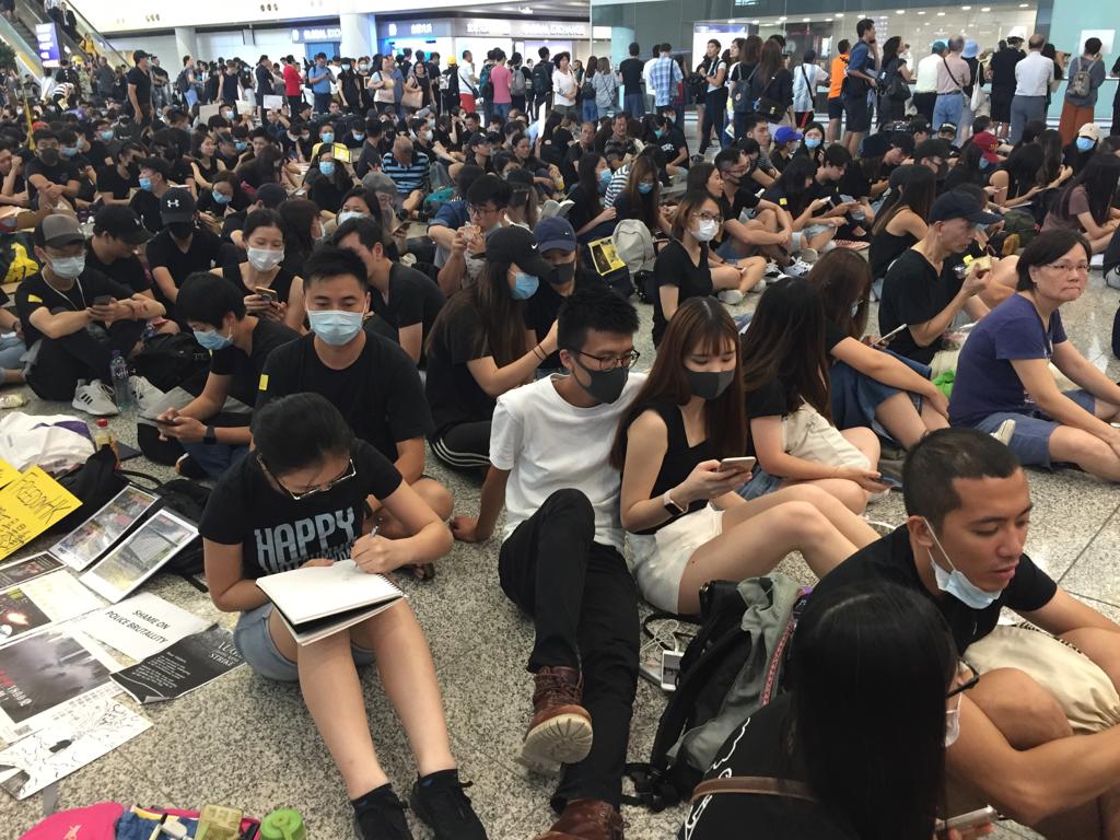 Hong_Kong_Judy_CHan_protest_at_airport.jpg