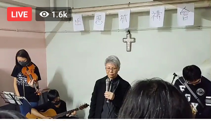 Rev._Phyllis_Wong_prays_at_memorial_service_for_young_student.jpg