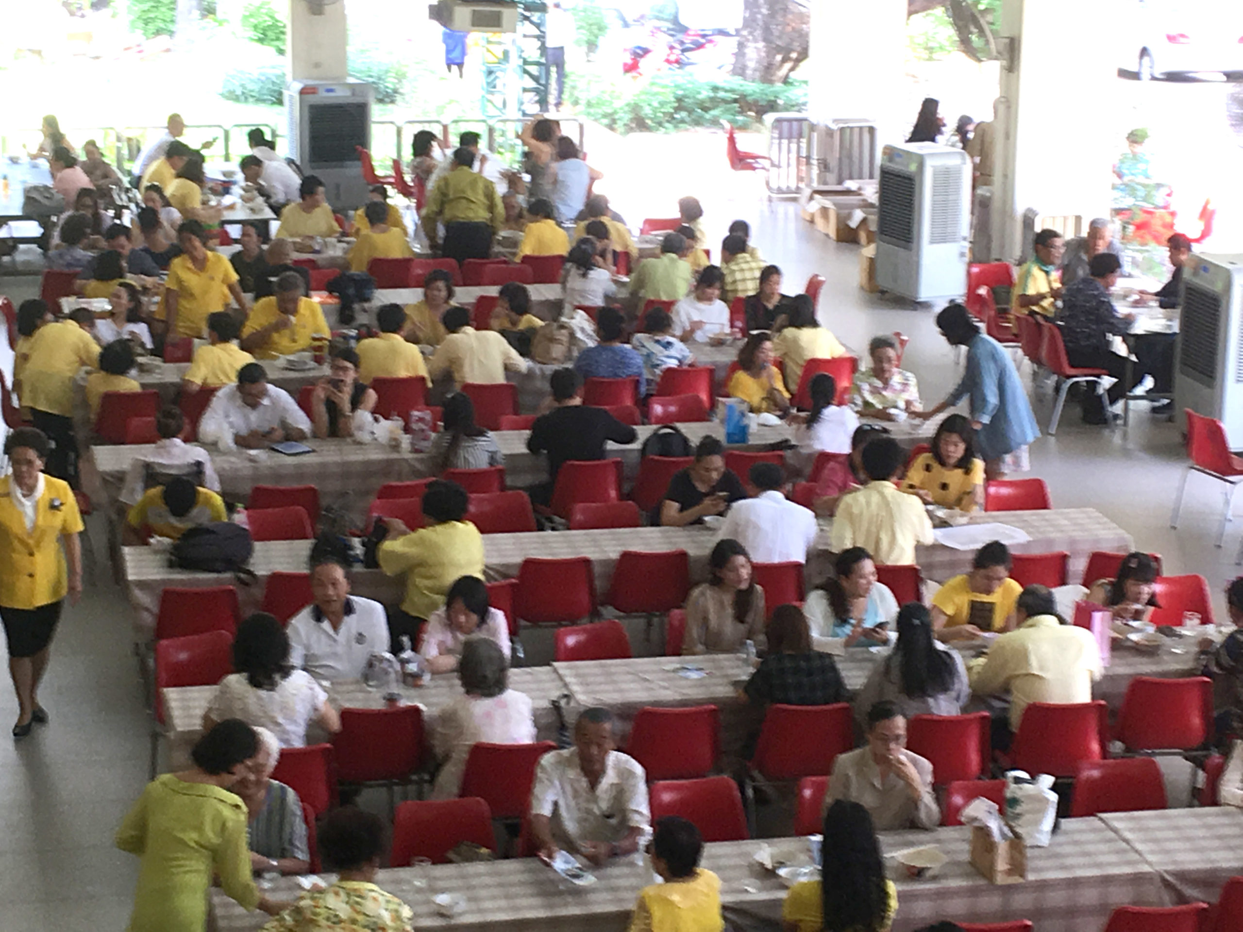 Thailand_Anne_Gregory_The_Beloved_Community_-_Sunday_lunch_-_yellow_shirts_honor_the_new_King.jpg